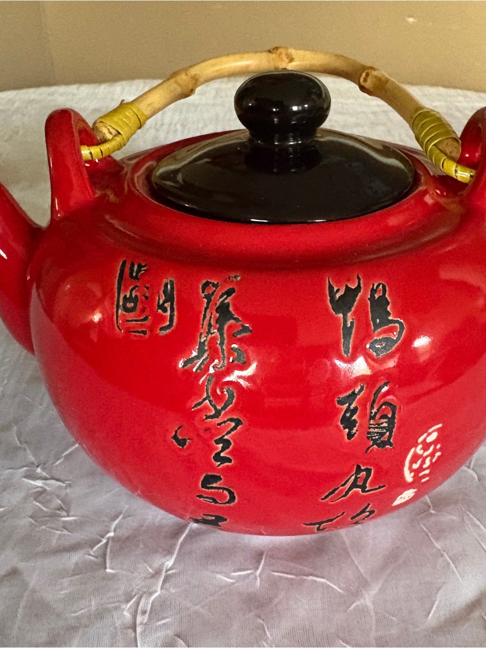 Red Ceramic Teapot with Black Lid and Calligraphy